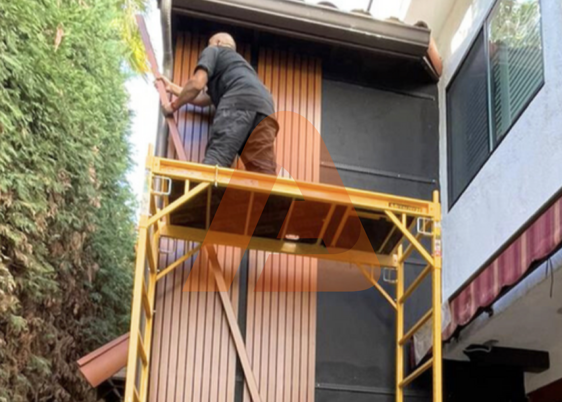 Wall cladding being installed on Dallas exterior