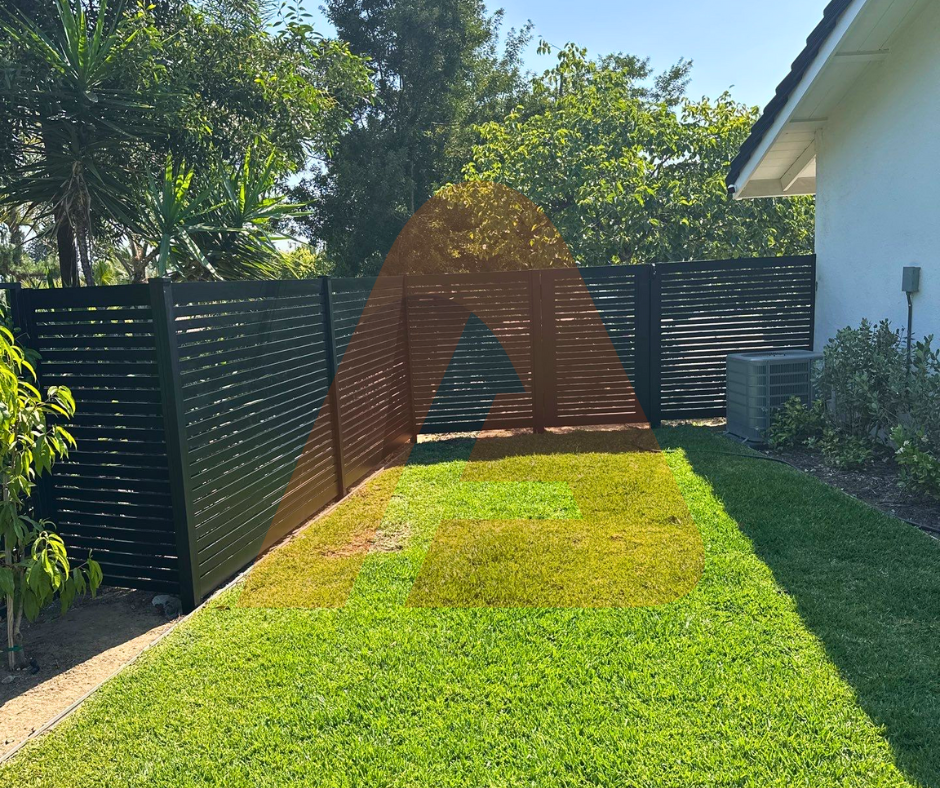 Contemporary property with horizontal aluminum fencing
