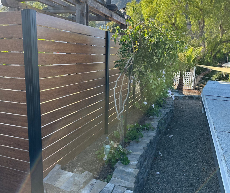 Woodgrain aluminum fence system detail
