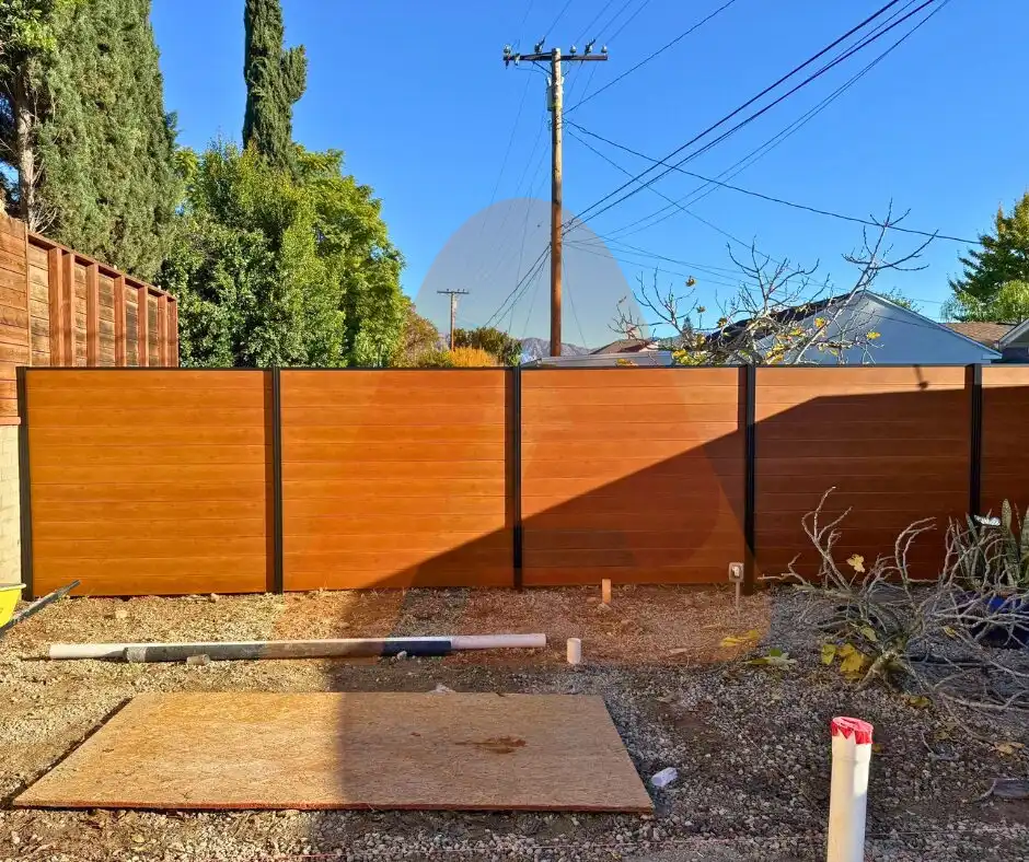 Real tall black horizontal aluminum privacy railing on a balcony