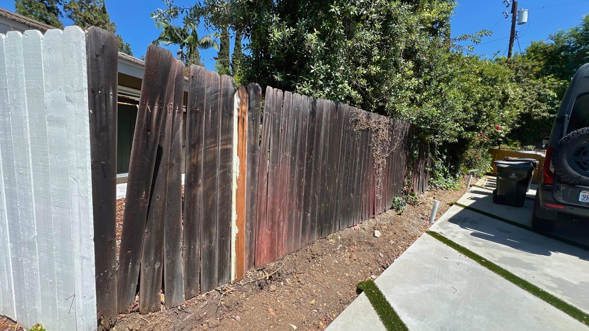 Before old wood fence
