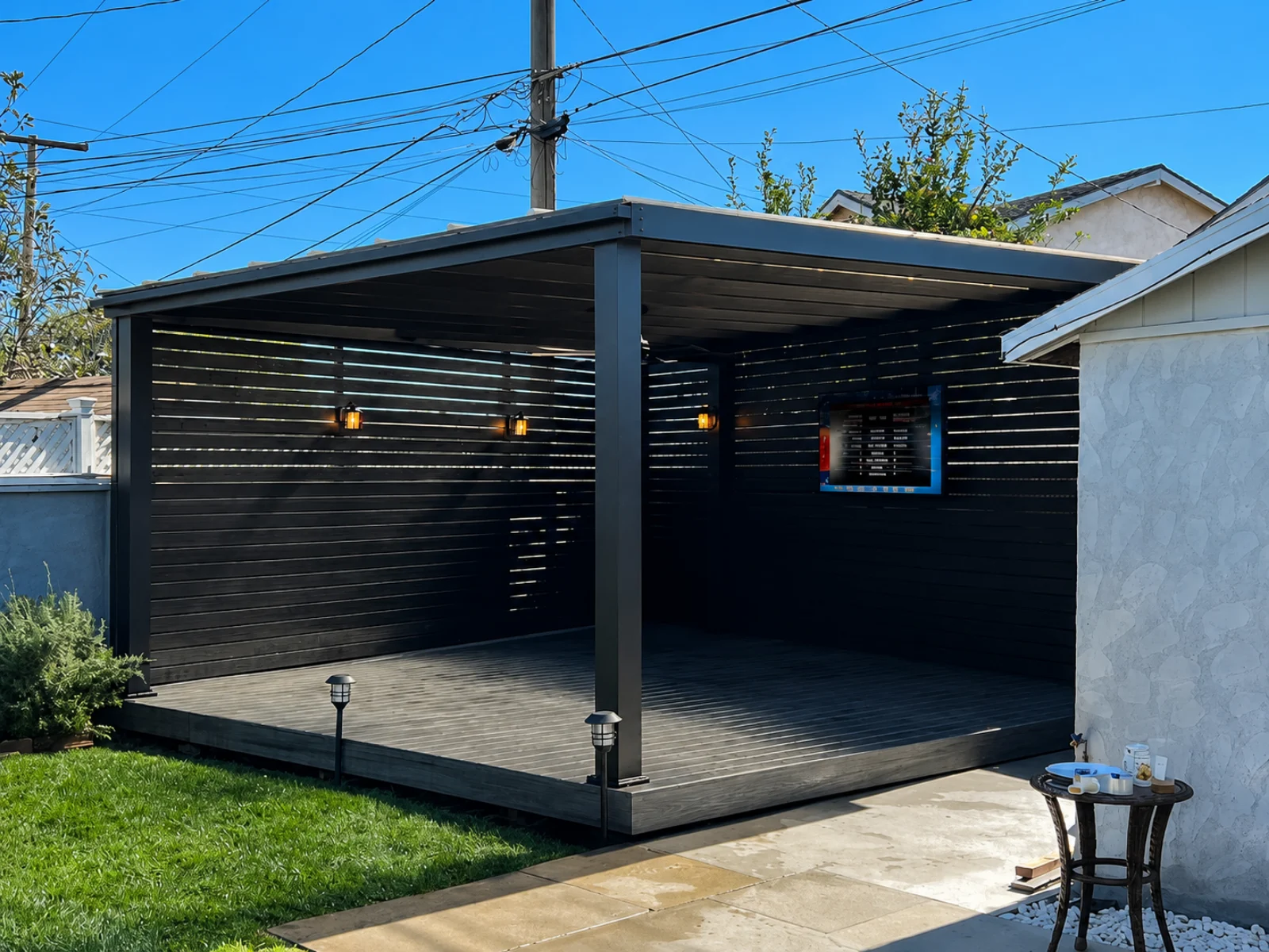 Aluminum lattice beam patio cover creating partial outdoor shade