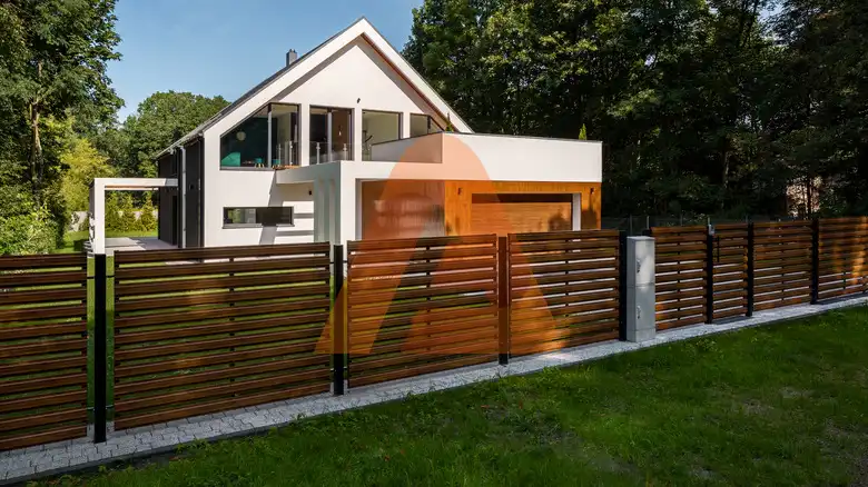 Spacious,White,House,With,Wooden,Decoration,On,Garage,And,Wood | How to Enhance Curb Appeal with Residential Fencing | Aluglobusfence.com